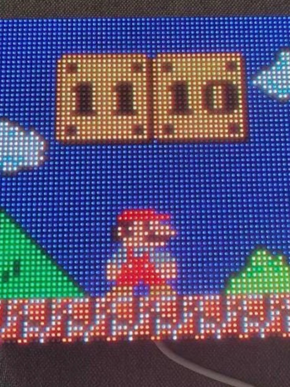 *Nintendo’s Super Mario Animated Pixel Art Wall Clock*